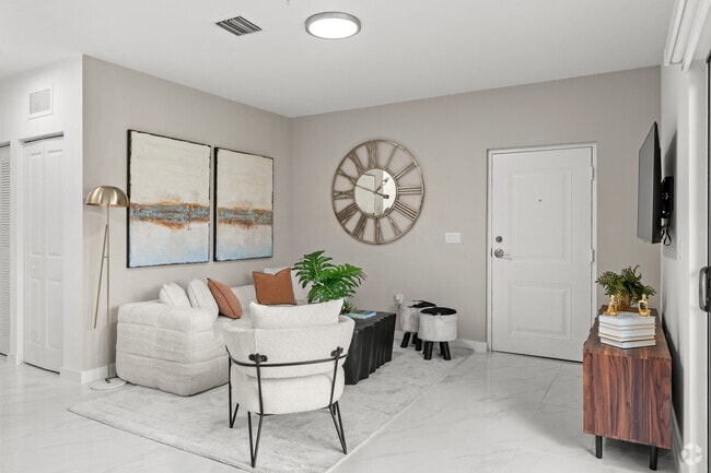 2BR, 2BA - 890SF - Living Room - Flamingo Village
