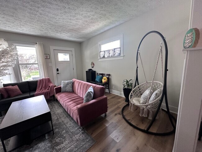 Living room with swing, shoerack - 1024 Lockbourne Rd