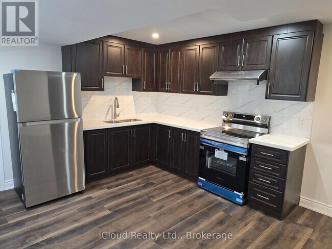 Photo du bâtiment - 5457 Meadowcrest Ave