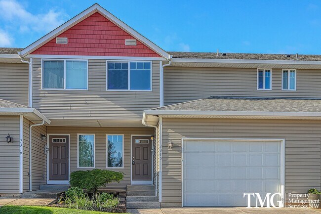 Building Photo - 2 Story Townhome with Vaulted Ceilings and...