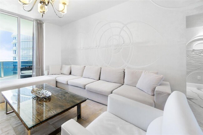 Building Photo - 15811 Collins Ave