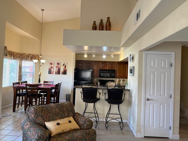 view of kitchen from living room - 890 Kitty Hawk Dr