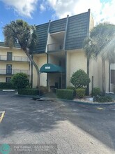 Building Photo - 9090 Lime Bay Blvd