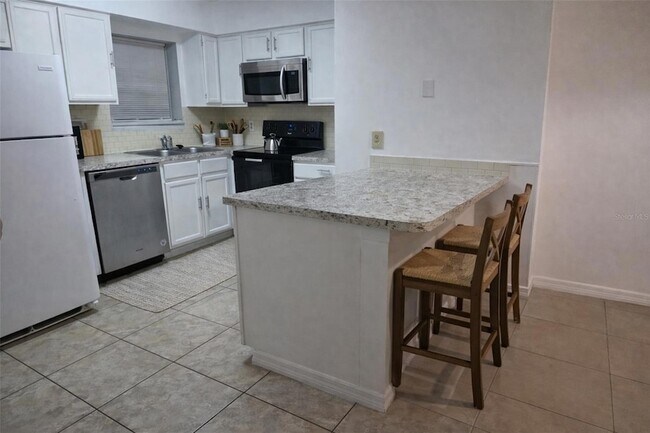 Foto del edificio - 4367 White Pine Ave