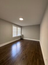 Primary Bedroom - Rogers Park Apartments