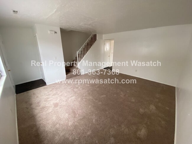 Building Photo - Check Out This Charming 3 Bedroom 1.5 Bathroom Condo in Midvale Ut!