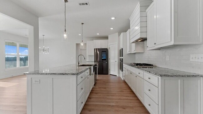 Building Photo - "Lovely 4-Bedroom Retreat with Fireplace &...