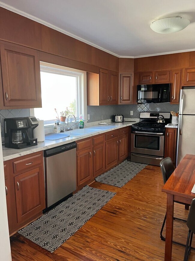 Building Photo - Mature Neighborhood, Modern Conveniences