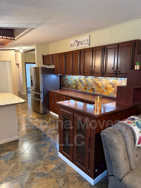 Foto del edificio - 906 Rolling Meadows Rd