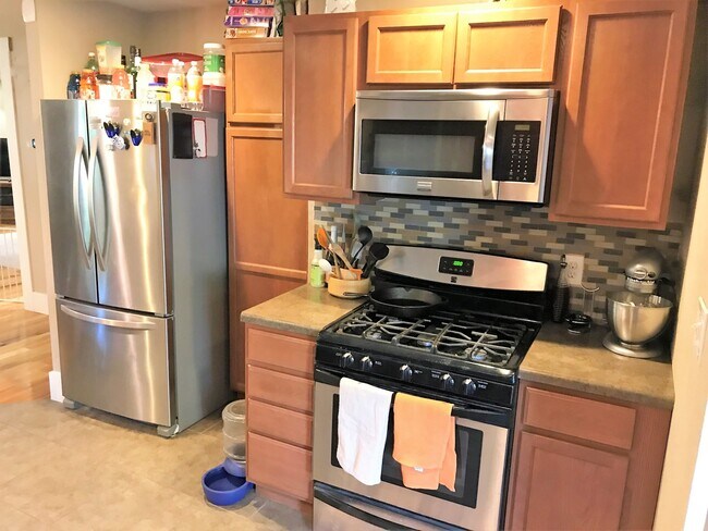Building Photo - Fenced-in Yard + Washer & Dryer Included +...