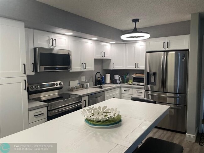 Building Photo - 9772 N Belfort Cir