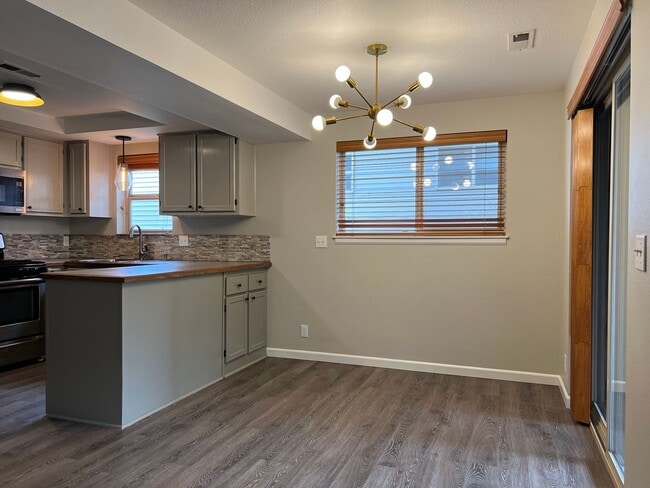 Building Photo - Water/Sewer/Garbage and landscaping included! A/C too!