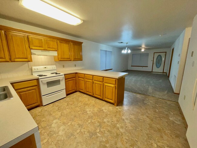 Building Photo - 2/2 with Outdoor Storage, Single Carport, ...