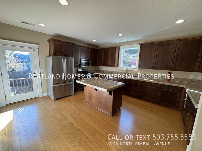 Building Photo - 8976 N Kimball Ave
