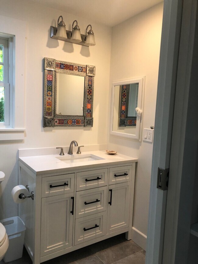 Bath with tiled Mexican mirror - 1228 Stratford Ave