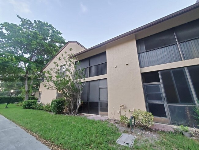 Building Photo - 3859 Cocoplum Cir