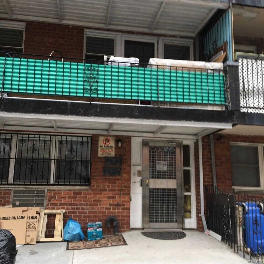 Building Photo - 142-17-142-38 38th Ave