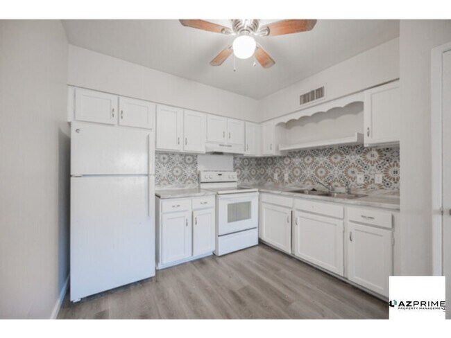 Building Photo - FIRST MONTH FREE RENT MOVE IN SPECIAL!  Introducing your New Oasis in this 2/1 Mesa 4-plex Unit!