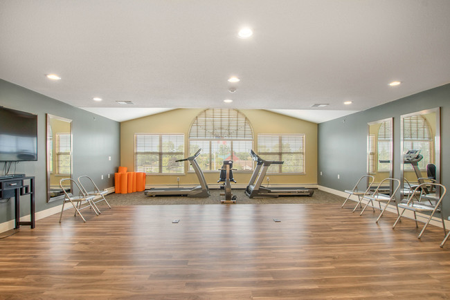 Wellington Woods Fitness Center & Yoga Room - Wellington Woods Senior Apartment Community