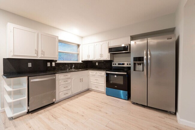 Building Photo - Gena Properties investment LLC -Garland