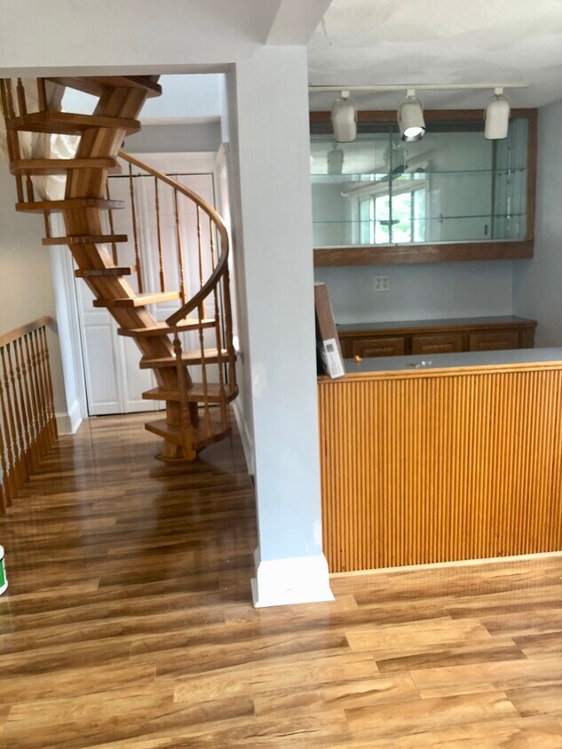 SPiral stairs with bar area - 99 Highland Ave