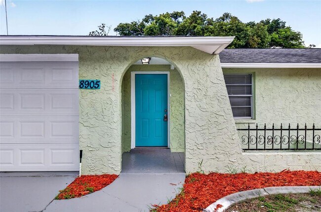 Building Photo - 8905 Tropical Palm Way