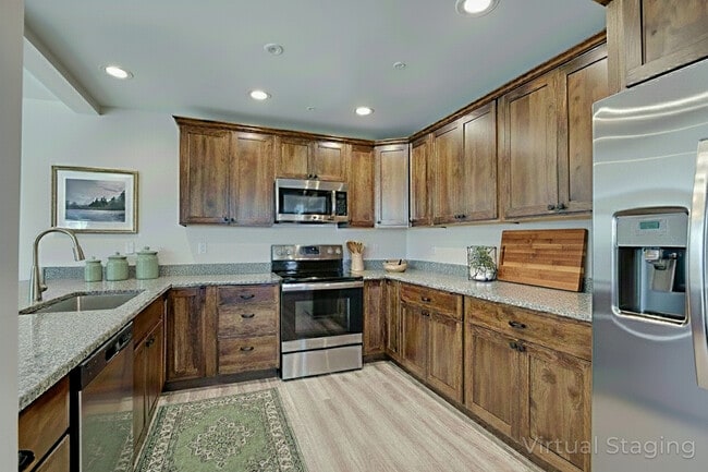 virtually staged kitchen - 710 Black Diamond St