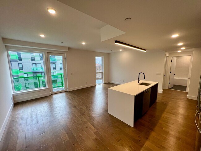 Foto del edificio - Stunning 2-Bed/2-Bath Condo with One-Car Garage and Rooftop Deck! Available NOW!