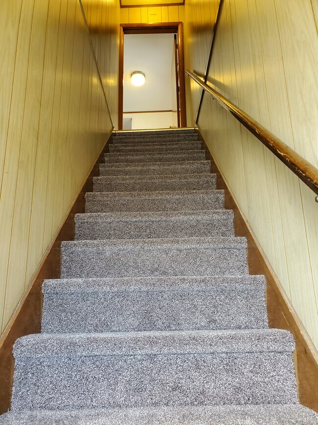 Stairway looking up - 131 W Utica St