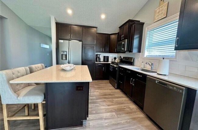 Building Photo - Stunning 4BR/3BA St Michael Home Available 5/1!