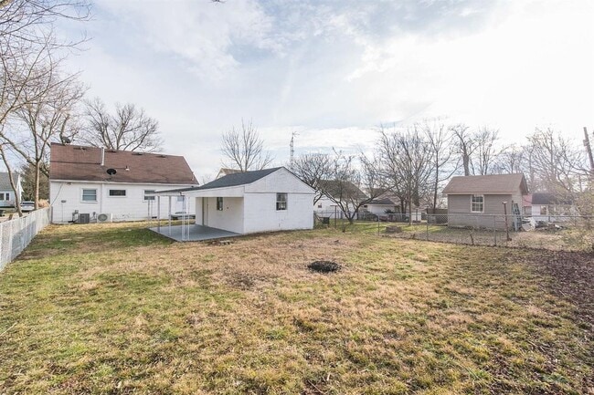 Building Photo - Spacious 4-Bedroom, 2-Bath Home with Garage, Side Parking & Private Backyard