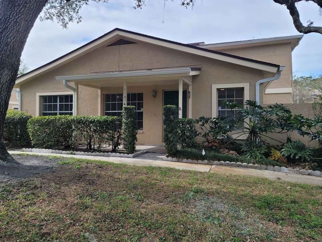 Primary Photo - Sought After Raintree Manor Townhome