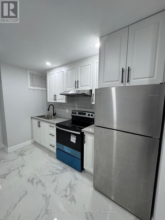 Photo du bâtiment - 414 Perth Ave