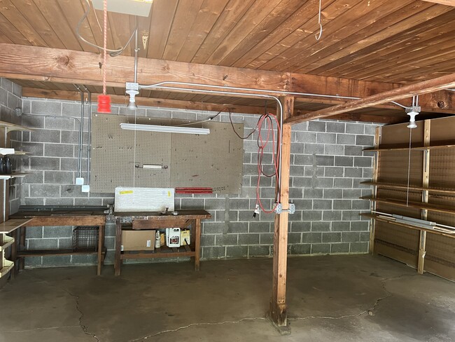 2 car garage with workbench - 665 Carriage Hill Dr
