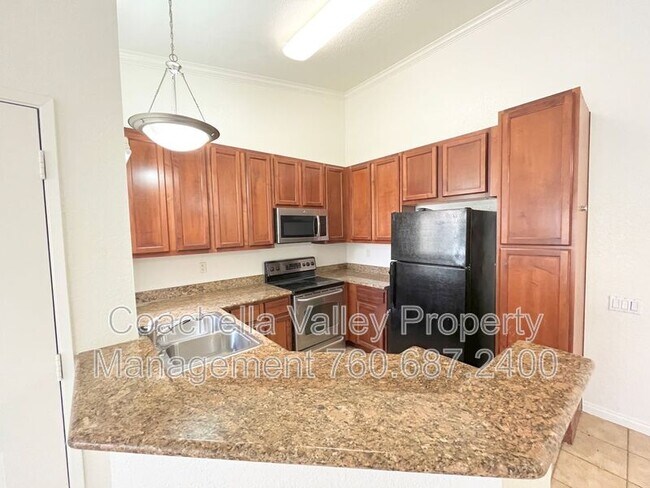 Building Photo - 78650 Ave 42