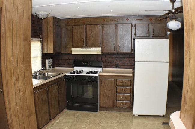 Foto del edificio - Charming Mobile Home with Utility Shed