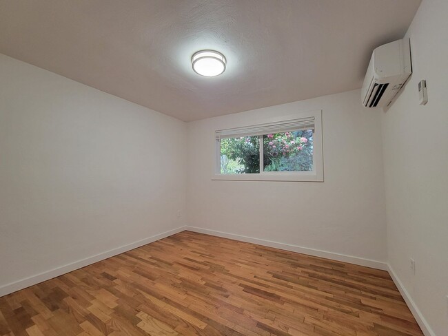 Building Photo - Updated 3 bedroom home with air conditioni...