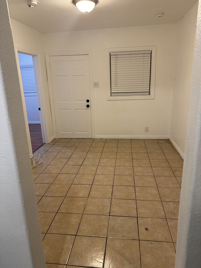 Living room and front door - 246 W 16th St