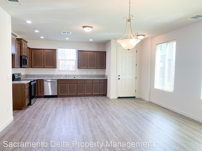 Building Photo - 6783 Mangosteen Ln