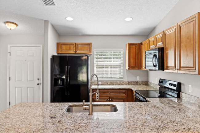 Building Photo - 9276 N Mendoza Way
