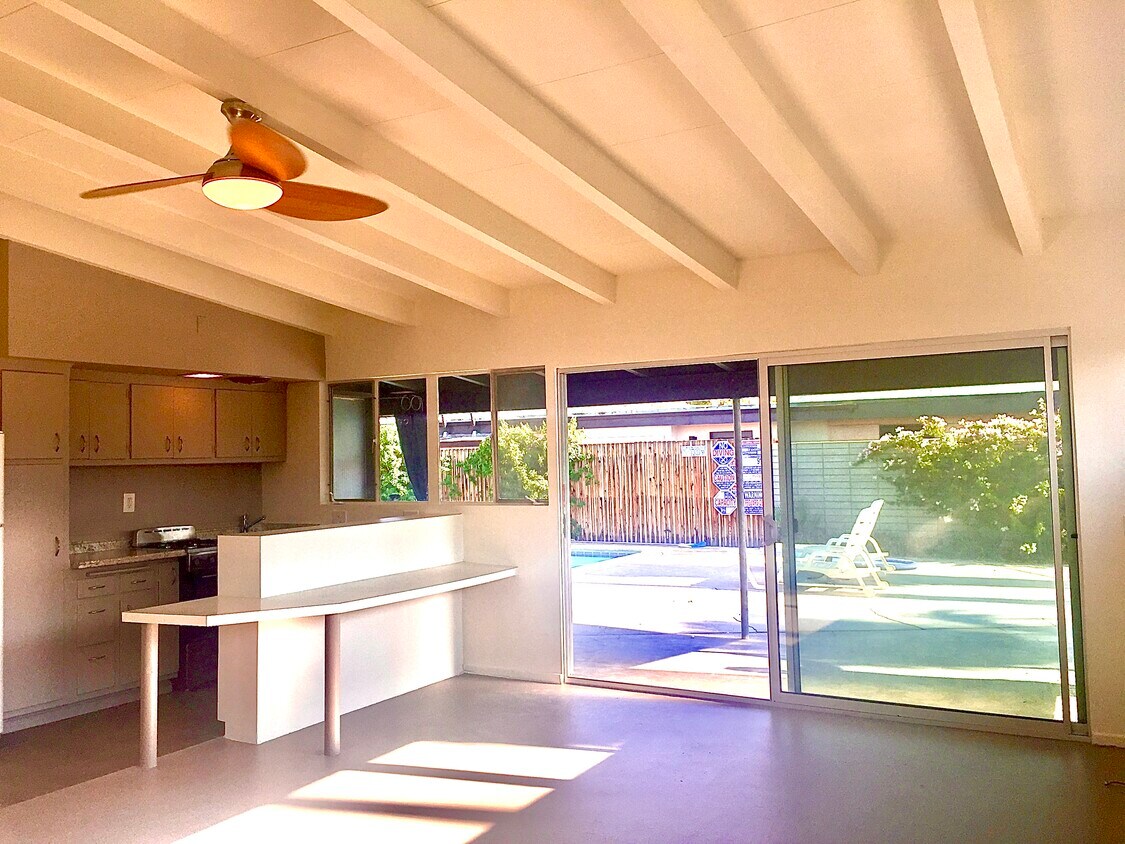 Vaulted ceilings with open floor plan and views over the pool. - 3715 E Calle de Ricardo
