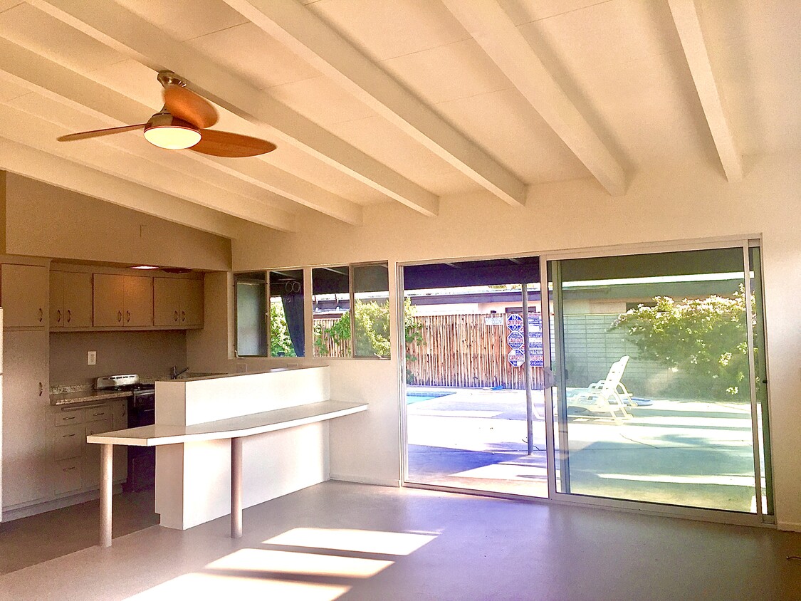 Vaulted ceilings with open floor plan and views over the pool. - 3715 E Calle de Ricardo