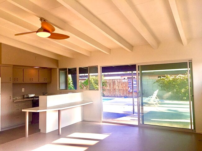 Vaulted ceilings with open floor plan and views over the pool. - 3715 E Calle de Ricardo