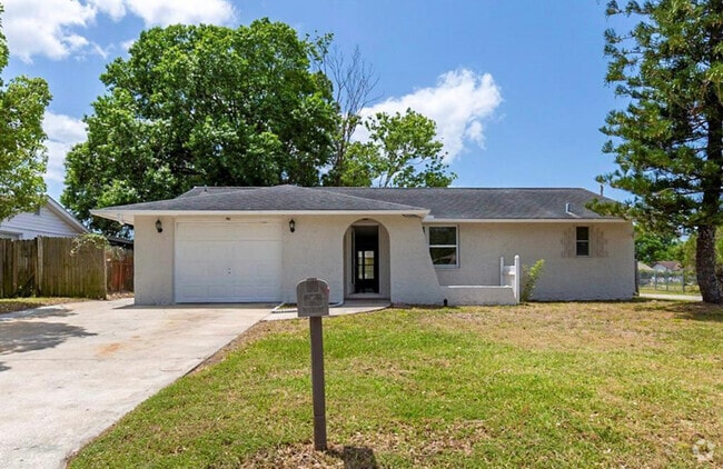 Building Photo - 8923 Tropical Palm Way