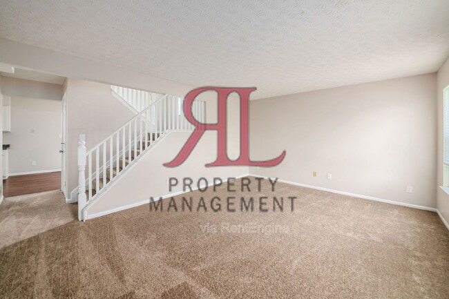 Building Photo - 7179 Feather Ct