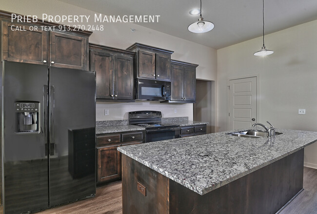 Building Photo - Reserve Townhome - Available May 17th
