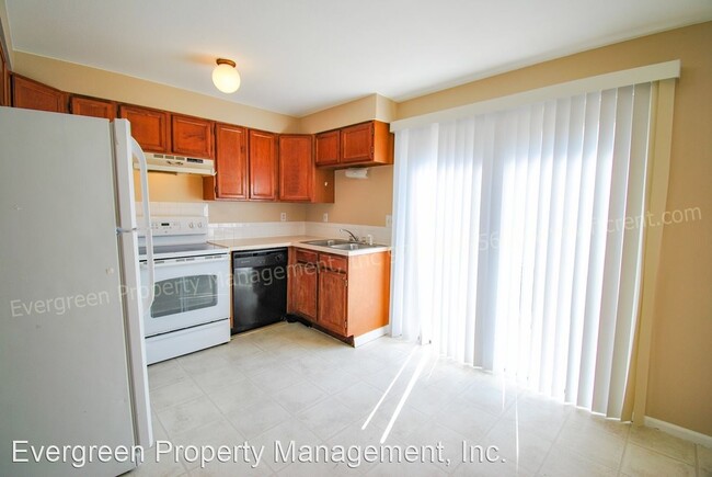 Building Photo - 4881-4887 Basswood Dr