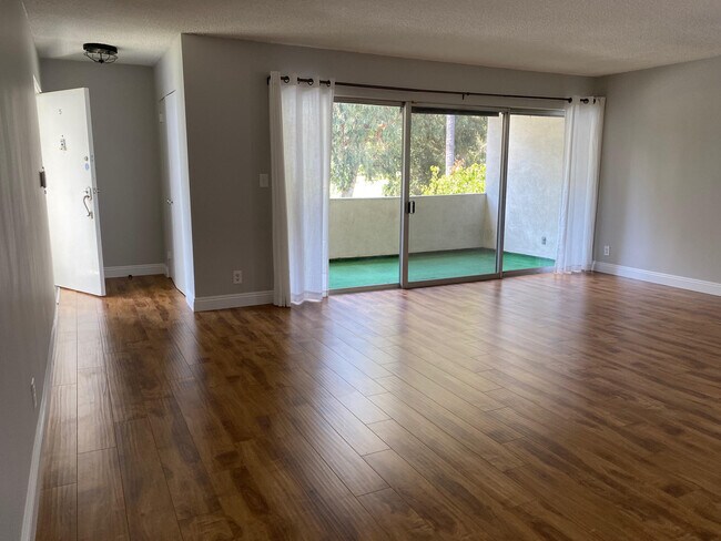 living room w/balcony - 12314 Montana Ave