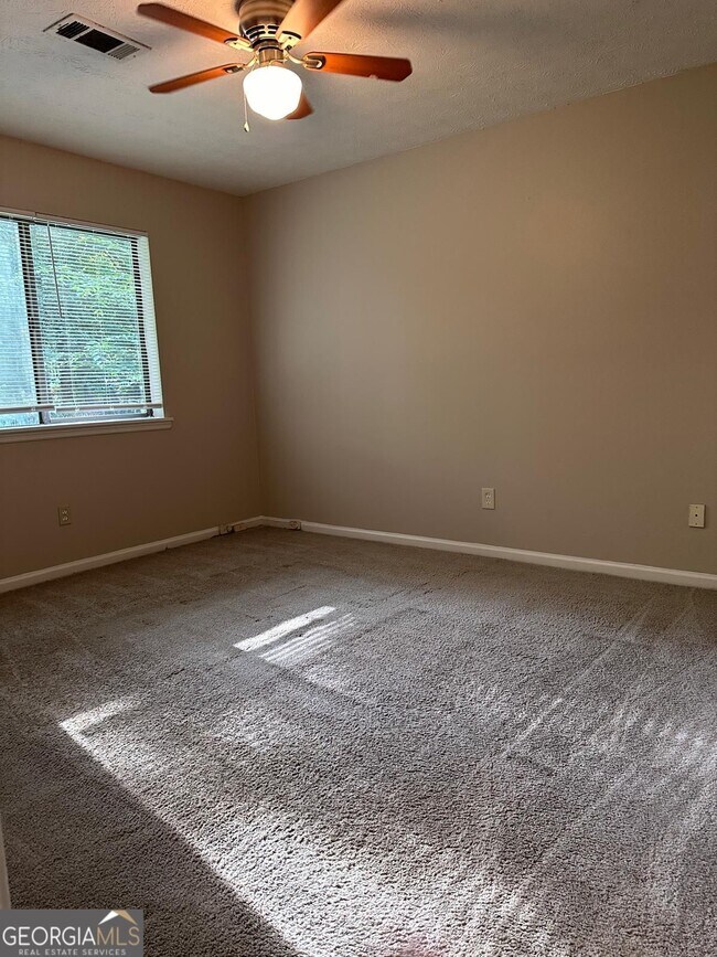 Building Photo - 9249 Woodgreen Way