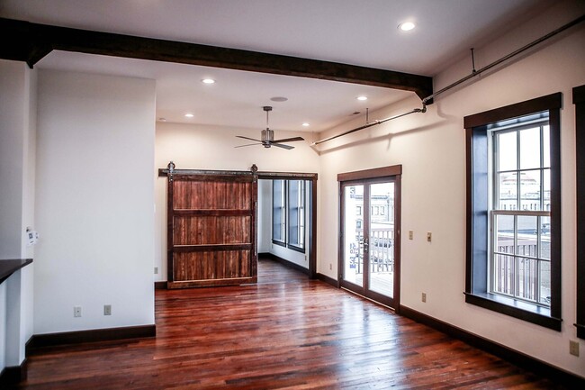 Living Room looking towards 1 of 2 bedrooms - 124 E Main St